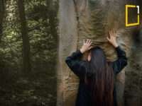 girl huging tree