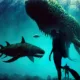 sea monsters with divers deep down in ocean